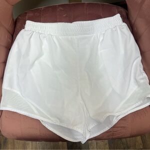 Athletic shorts with zip up pockets